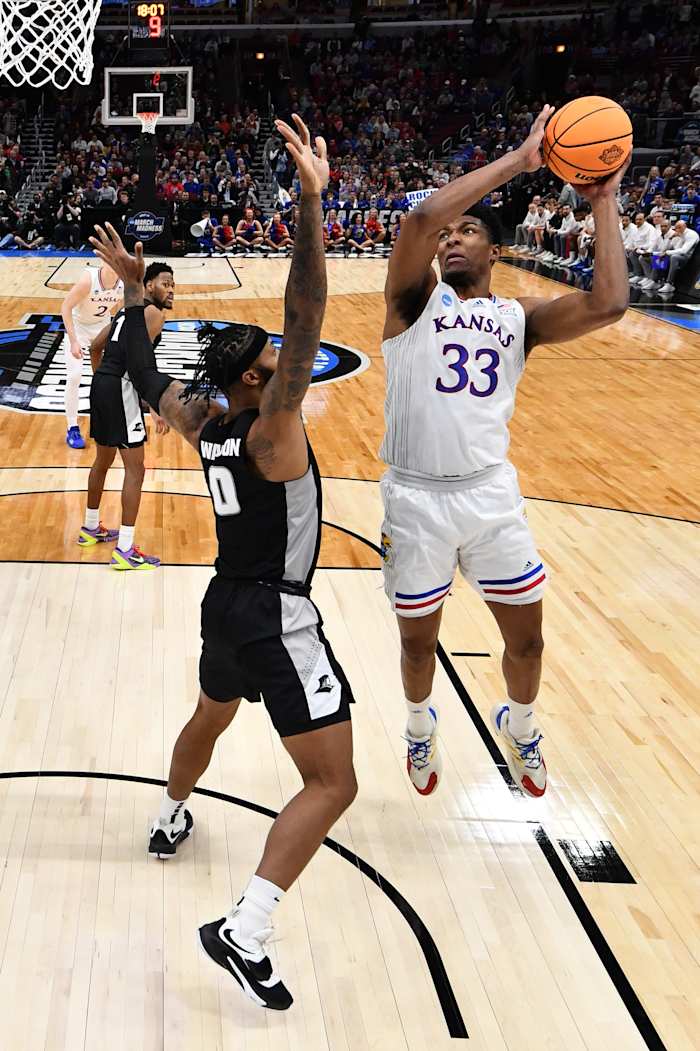 Mar 25, 2022; Chicago, IL, USA; Kansas Jayhawks forward David McCormack (33) shoots over Providence Friars center Nate Watson (0) during the first half in the semifinals of the Midwest regional of the men's college basketball NCAA Tournament at United Center. Mandatory Credit: Jamie Sabau-USA TODAY Sports